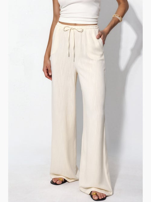 Pantalones anchos de pierna ancha hiccup - Kiabi Pantalones anchos de pierna ancha hiccup - Kiabi