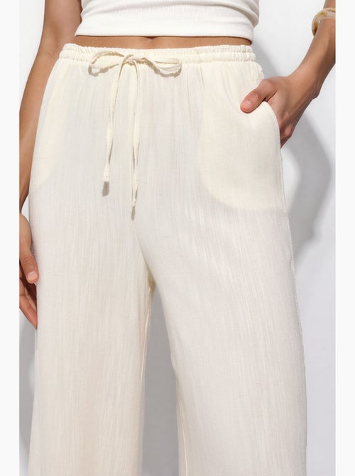 Pantalones anchos de pierna ancha hiccup - Kiabi Pantalones anchos de pierna ancha hiccup - Kiabi