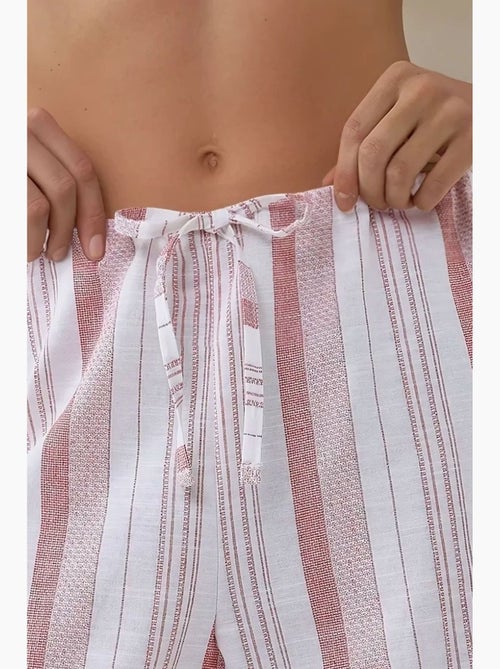 Pantalones anchos de rayas y corte relajado hiccup - Kiabi Pantalones anchos de rayas y corte relajado hiccup - Kiabi