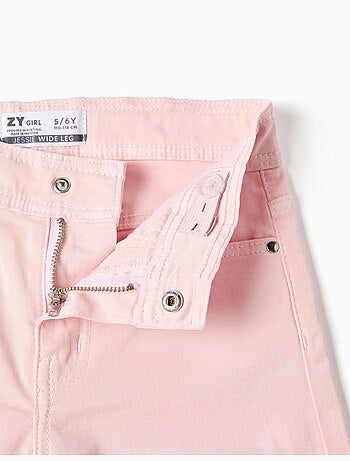 Pantalones anchos de sarga con bajos deshilachados