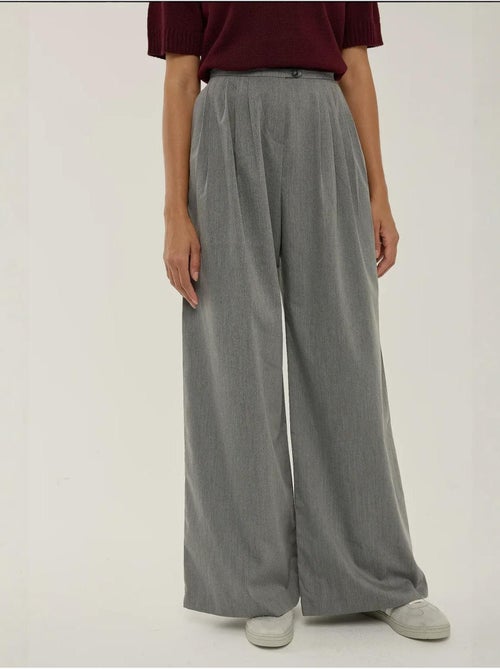 Pantalones anchos plisados hiccup - Kiabi Pantalones anchos plisados hiccup - Kiabi