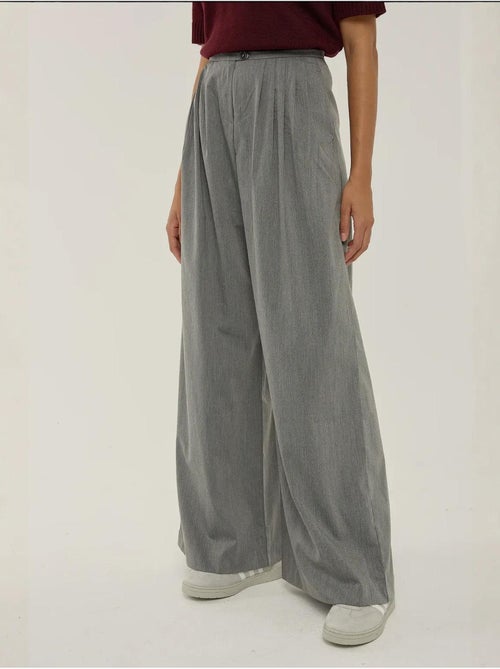 Pantalones anchos plisados hiccup - Kiabi Pantalones anchos plisados hiccup - Kiabi