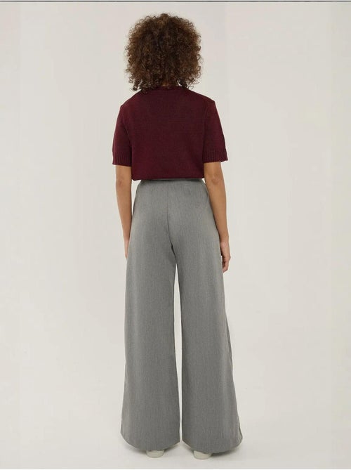Pantalones anchos plisados hiccup - Kiabi Pantalones anchos plisados hiccup - Kiabi