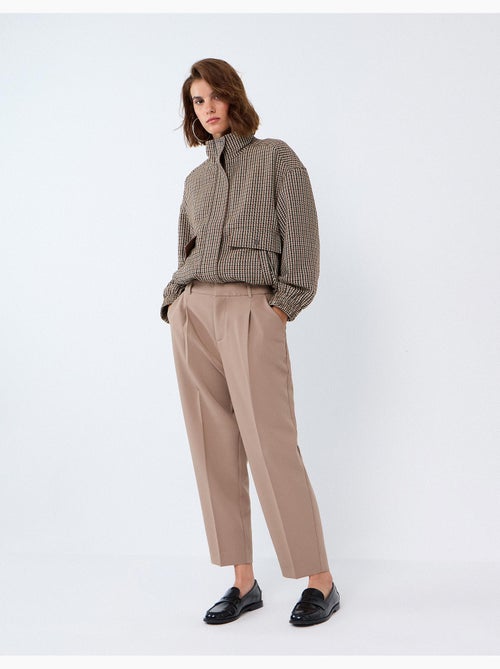 Pantalones arrugados, mo fashion - Kiabi Pantalones arrugados, mo fashion - Kiabi