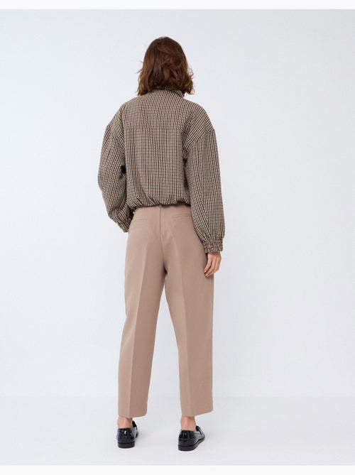 Pantalones arrugados, mo fashion - Kiabi Pantalones arrugados, mo fashion - Kiabi