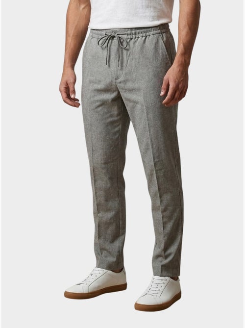 Pantalones casuales elegantes con cordón ajustable - Kiabi Pantalones casuales elegantes con cordón ajustable - Kiabi
