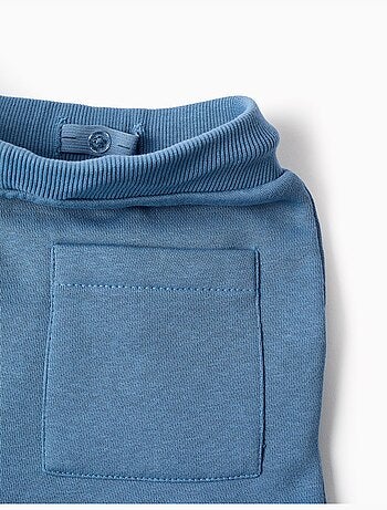 Pantalón cargo perchado con estampado Creative