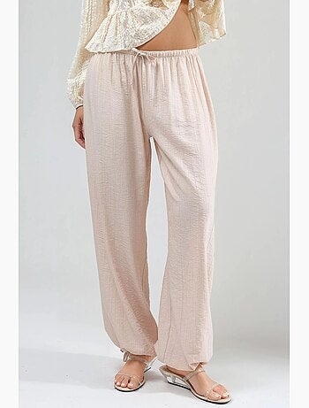Pantalones con cintura elástica y detalle de lazo busem