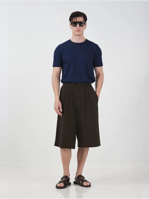 Pantalones cortos capri de pierna ancha de tiro medio con cintura con cordón giesto - Kiabi Pantalones cortos capri de pierna ancha de tiro medio con cintura con cordón giesto - Kiabi