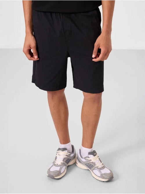 Pantalones cortos chinos de hombre de corte regular tommy - Kiabi Pantalones cortos chinos de hombre de corte regular tommy - Kiabi