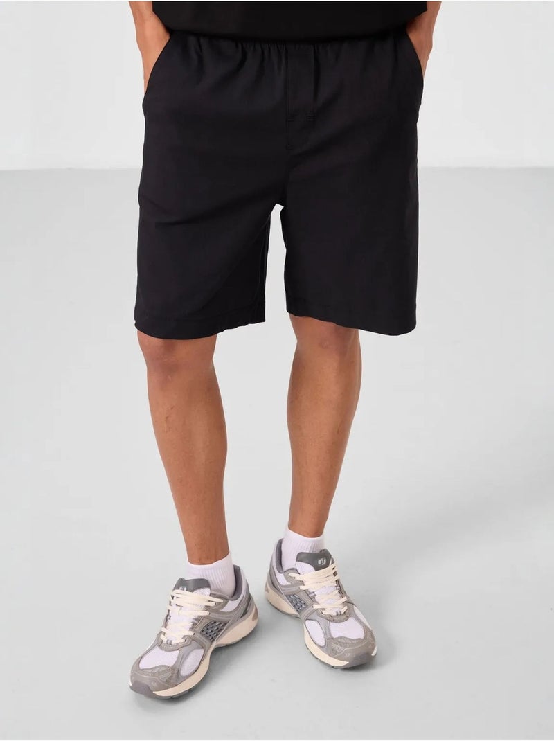 Pantalones cortos chinos de hombre de corte regular tommy Negro - Kiabi