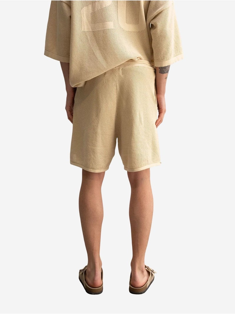 Pantalones cortos de chándal de punto texturizado de tiro medio giesto Beige arcilla - Kiabi