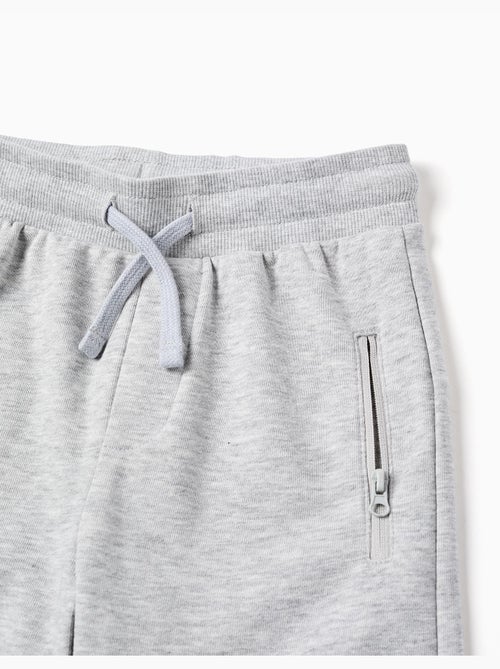 Pantalones cortos de felpa con cordón y bolsillos - Kiabi