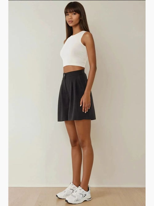 Pantalones cortos de lyocell suave al tacto y cintura alta plisados hiccup - Kiabi Pantalones cortos de lyocell suave al tacto y cintura alta plisados hiccup - Kiabi