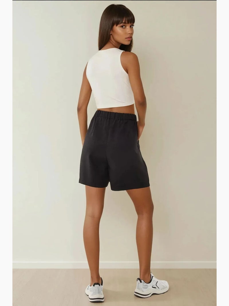 Pantalones cortos de lyocell suave al tacto y cintura alta plisados hiccup Negro - Kiabi