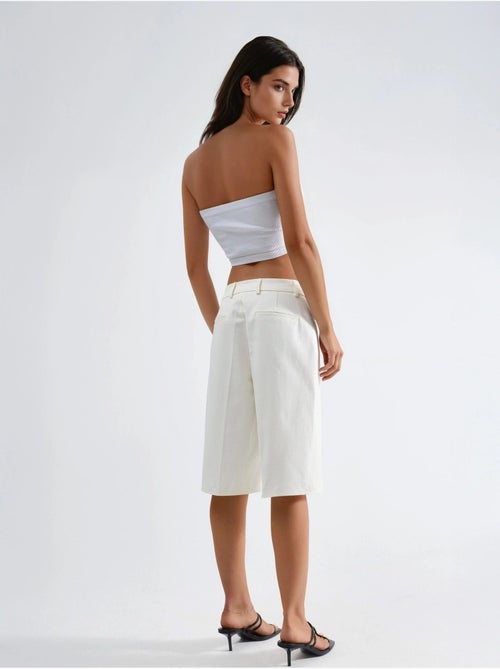 Pantalones cortos de pierna ancha y largo midi de ajuste cómodo hiccup - Kiabi Pantalones cortos de pierna ancha y largo midi de ajuste cómodo hiccup - Kiabi