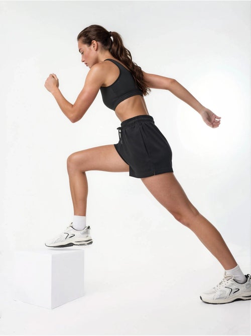 Pantalones cortos de punto de talle medio y corte relajado hiccup - Kiabi Pantalones cortos de punto de talle medio y corte relajado hiccup - Kiabi