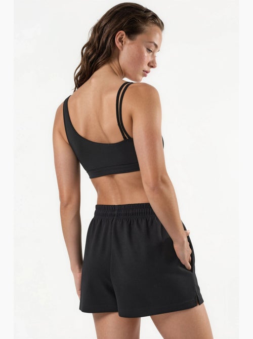 Pantalones cortos de punto de talle medio y corte relajado hiccup - Kiabi Pantalones cortos de punto de talle medio y corte relajado hiccup - Kiabi