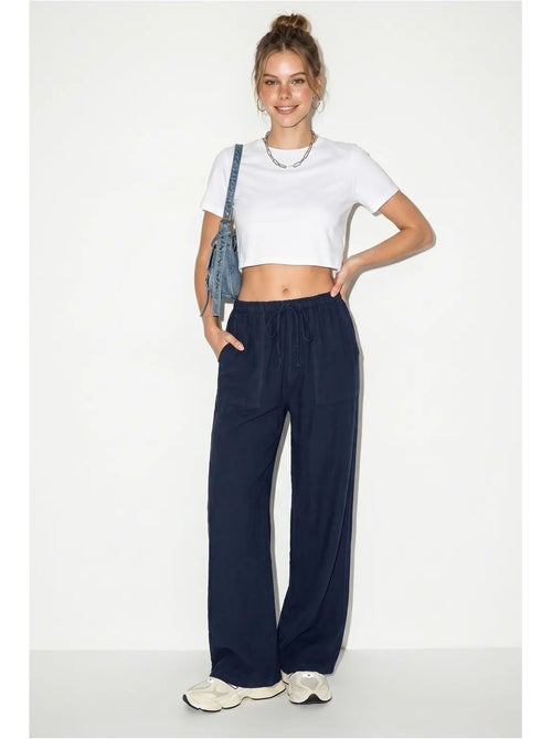 Pantalones de algodón de pernera ancha con cintura de cordón lucci - Kiabi Pantalones de algodón de pernera ancha con cintura de cordón lucci - Kiabi