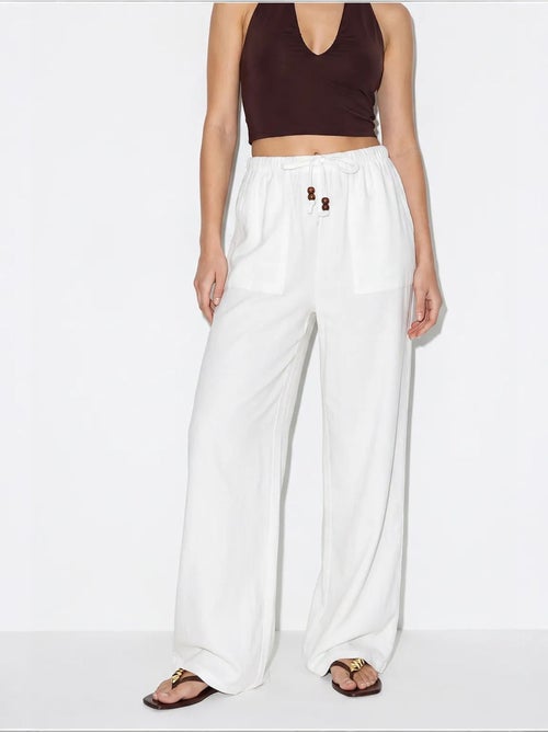 Pantalones de algodón de pernera ancha con cintura de cordón lucci - Kiabi Pantalones de algodón de pernera ancha con cintura de cordón lucci - Kiabi