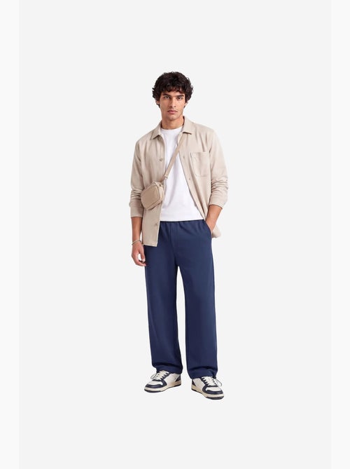 Pantalones de chándal de hombre en mezcla de algodón tommy - Kiabi Pantalones de chándal de hombre en mezcla de algodón tommy - Kiabi