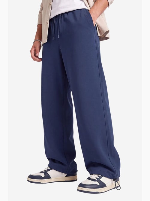 Pantalones de chándal de hombre en mezcla de algodón tommy - Kiabi Pantalones de chándal de hombre en mezcla de algodón tommy - Kiabi