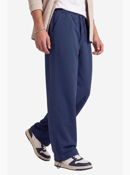 Pantalones de chándal de hombre en mezcla de algodón tommy - Kiabi Pantalones de chándal de hombre en mezcla de algodón tommy - Kiabi