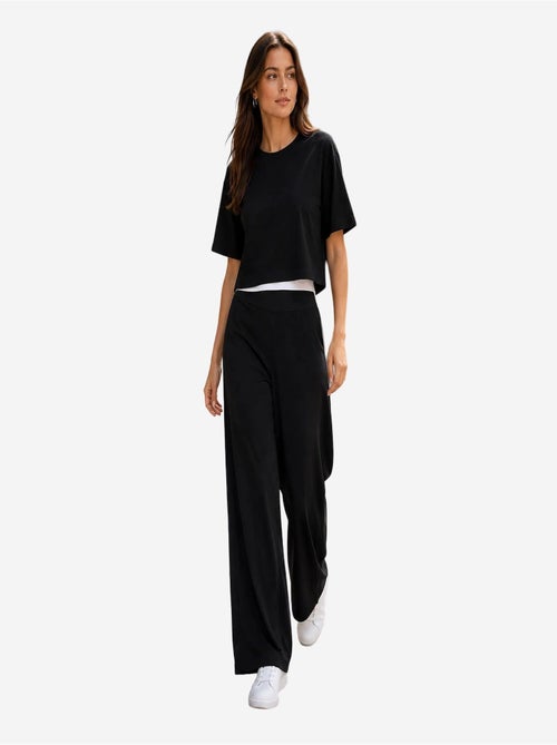 Pantalones de chándal de mujer en mezcla de viscosa tommy - Kiabi Pantalones de chándal de mujer en mezcla de viscosa tommy - Kiabi