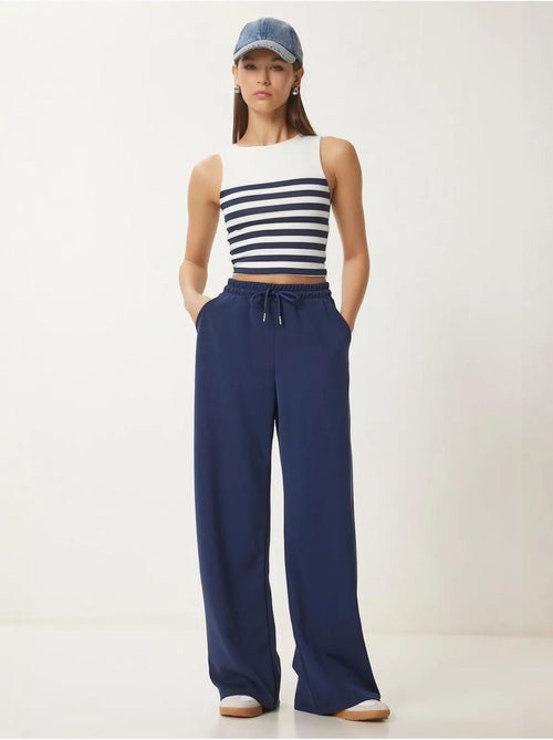 Pantalones de chándal de pierna ancha con cintura de cordón istanbul - Kiabi Pantalones de chándal de pierna ancha con cintura de cordón istanbul - Kiabi
