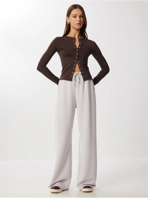 Pantalones de chándal de pierna ancha con cintura de cordón istanbul - Kiabi Pantalones de chándal de pierna ancha con cintura de cordón istanbul - Kiabi