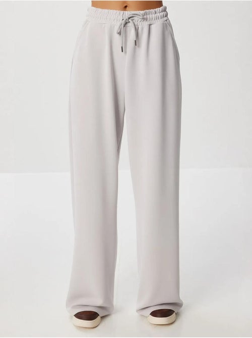 Pantalones de chándal de pierna ancha con cintura de cordón istanbul - Kiabi Pantalones de chándal de pierna ancha con cintura de cordón istanbul - Kiabi