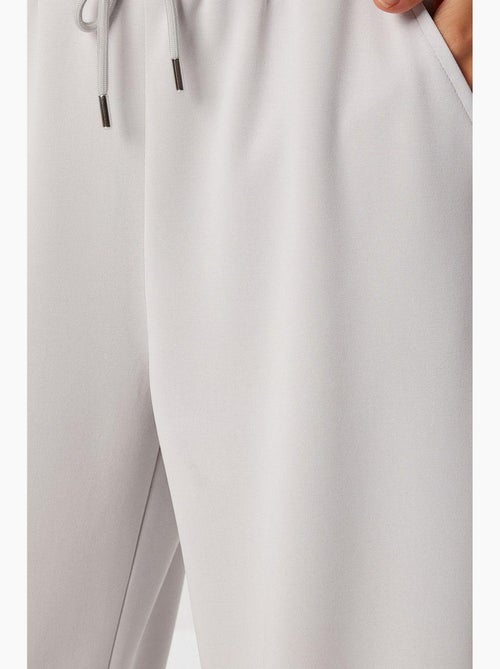 Pantalones de chándal de pierna ancha con cintura de cordón istanbul - Kiabi Pantalones de chándal de pierna ancha con cintura de cordón istanbul - Kiabi