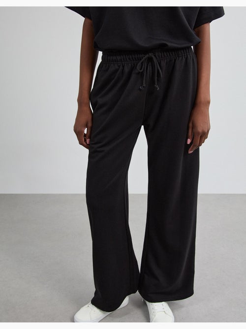 Pantalones de chándal de pierna ancha, mo fashion - Kiabi Pantalones de chándal de pierna ancha, mo fashion - Kiabi