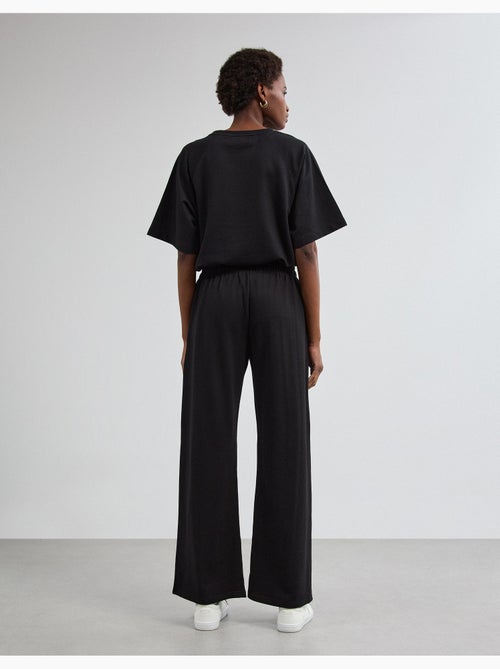 Pantalones de chándal de pierna ancha, mo fashion - Kiabi Pantalones de chándal de pierna ancha, mo fashion - Kiabi