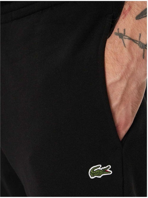 Pantalones de chándal diseño logotipos bordados para hombre - lacoste - Kiabi Pantalones de chándal diseño logotipos bordados para hombre - lacoste - Kiabi