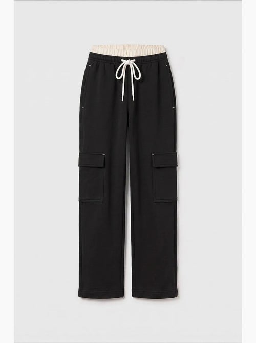 Pantalones de chándal juveniles unisex de algodón y poliéster tommy - Kiabi Pantalones de chándal juveniles unisex de algodón y poliéster tommy - Kiabi
