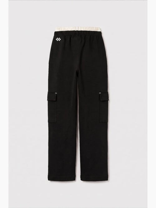 Pantalones de chándal juveniles unisex de algodón y poliéster tommy - Kiabi Pantalones de chándal juveniles unisex de algodón y poliéster tommy - Kiabi