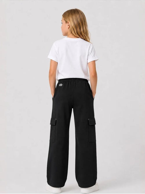 Pantalones de chándal juveniles unisex de algodón y poliéster tommy - Kiabi Pantalones de chándal juveniles unisex de algodón y poliéster tommy - Kiabi