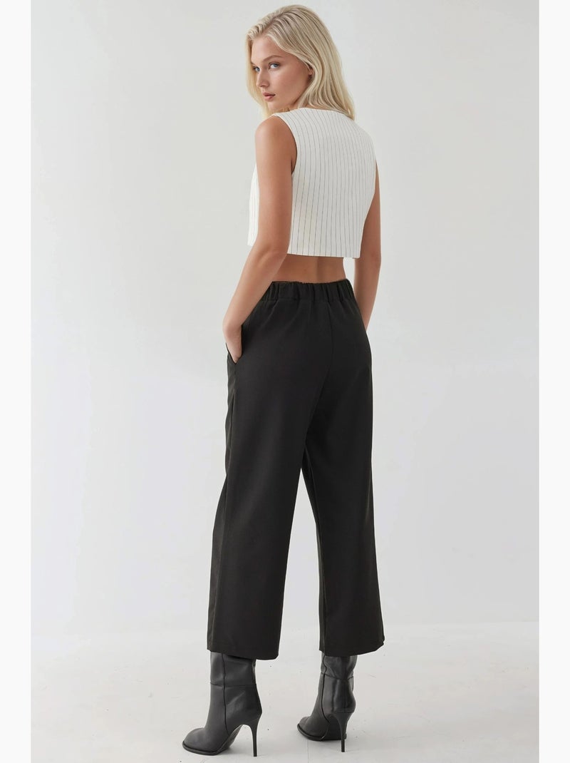 Pantalones de cintura alta con detalle de botones hiccup Negro - Kiabi