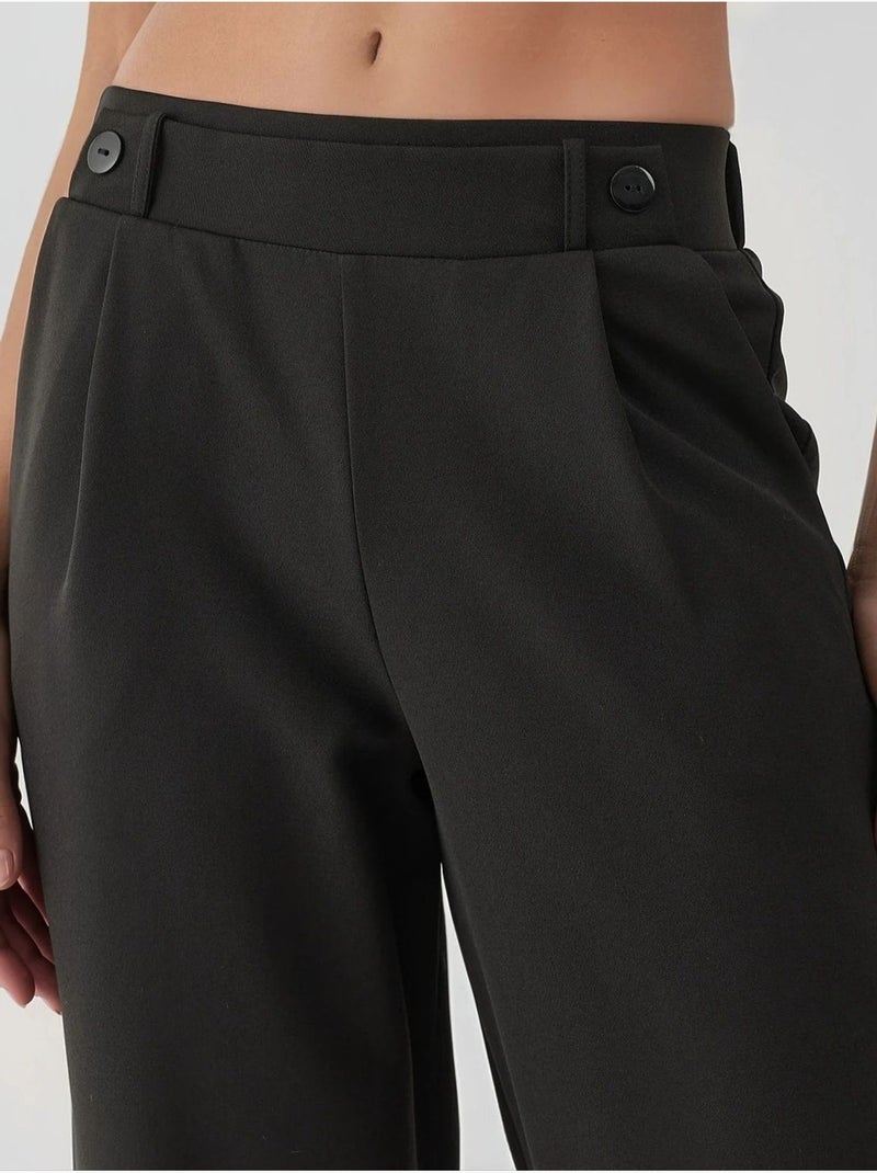 Pantalones de cintura alta con detalle de botones hiccup Negro - Kiabi