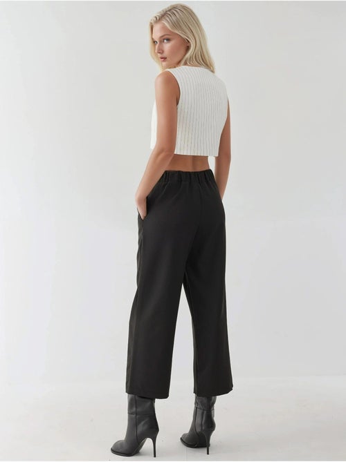 Pantalones de cintura alta con detalle de botones - Kiabi