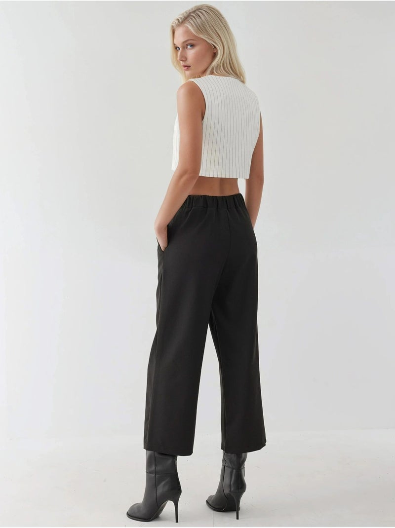 Pantalones de cintura alta con detalle de botones Negro - Kiabi