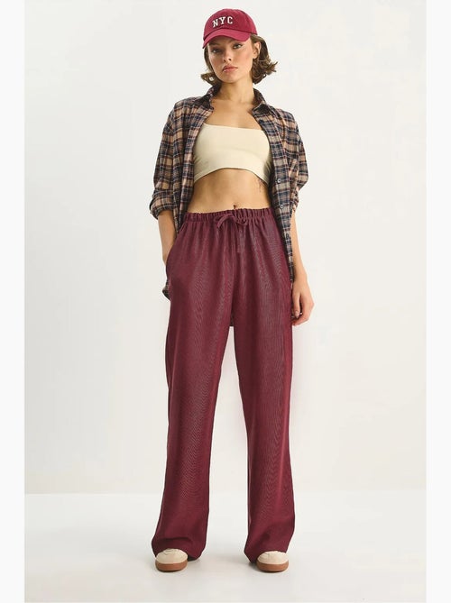 Pantalones de cintura alta y pierna ancha lucci - Kiabi Pantalones de cintura alta y pierna ancha lucci - Kiabi