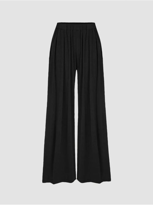 Pantalones de cintura elástica y pierna ancha - Kiabi Pantalones de cintura elástica y pierna ancha - Kiabi