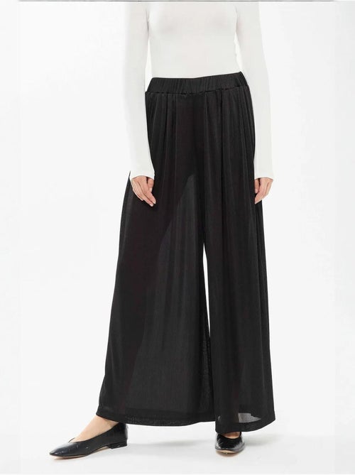 Pantalones de cintura elástica y pierna ancha - Kiabi Pantalones de cintura elástica y pierna ancha - Kiabi