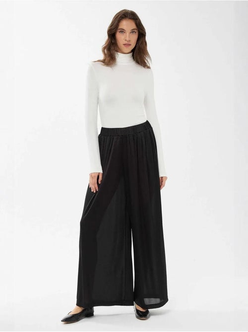 Pantalones de cintura elástica y pierna ancha - Kiabi Pantalones de cintura elástica y pierna ancha - Kiabi