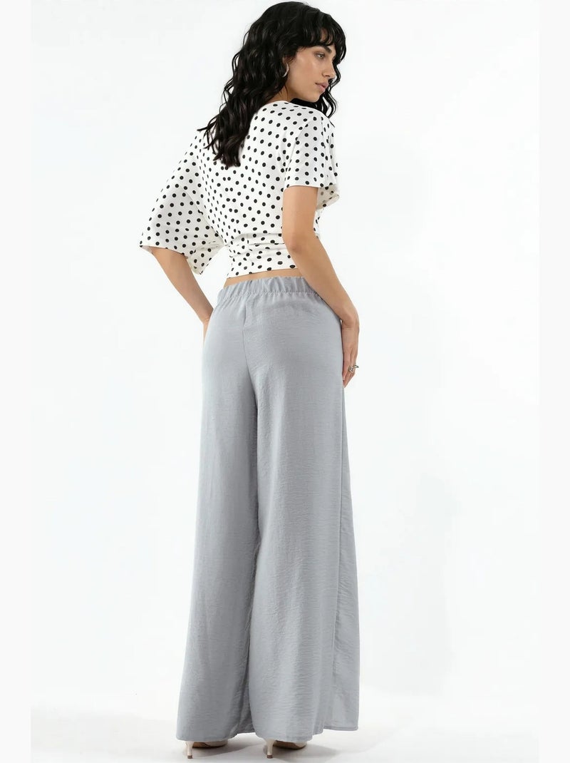 Pantalones de crepé con cintura con cordón y detalle de lazo busem Gris claro - Kiabi