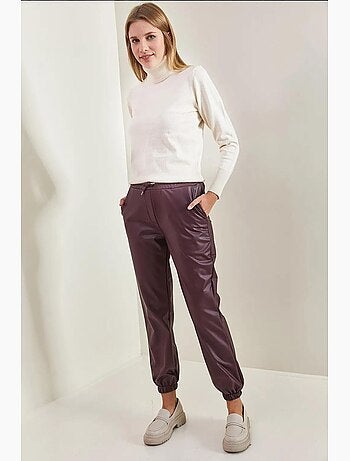 Pantalones de cuero con cintura y puños elásticos lucci