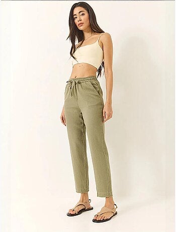 Pantalones de lino con cintura anudada y pernera cónica de bianco con bolsillos lucci