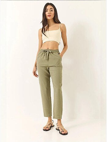 Pantalones de lino con cintura anudada y pernera cónica de bianco con bolsillos lucci